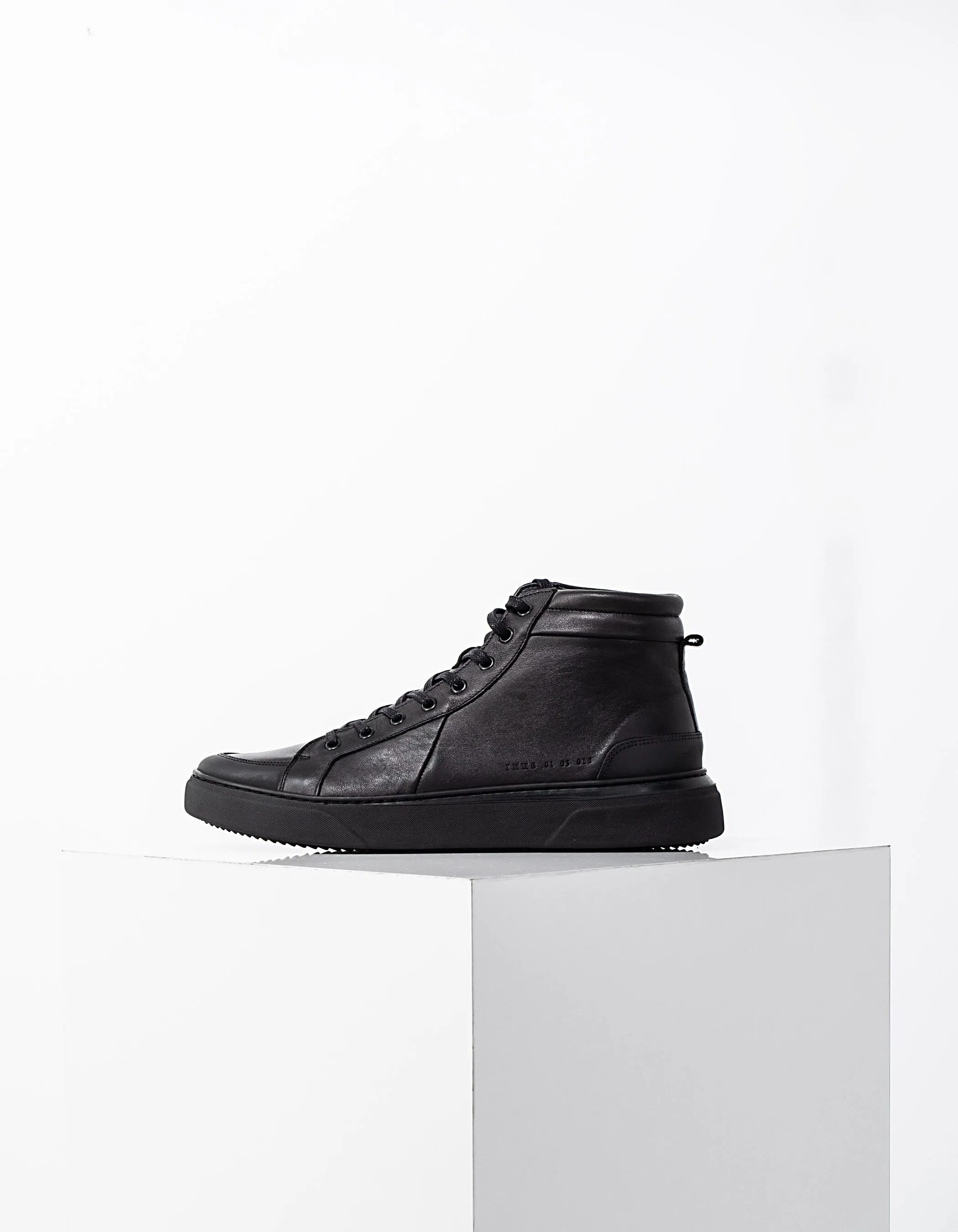 Baskets noires en cuir Homme