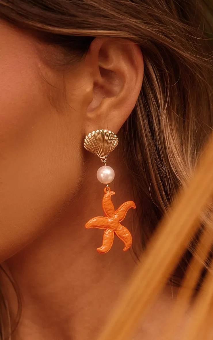 Boucles d'oreilles rouges à détail coquillage et étoile de mer