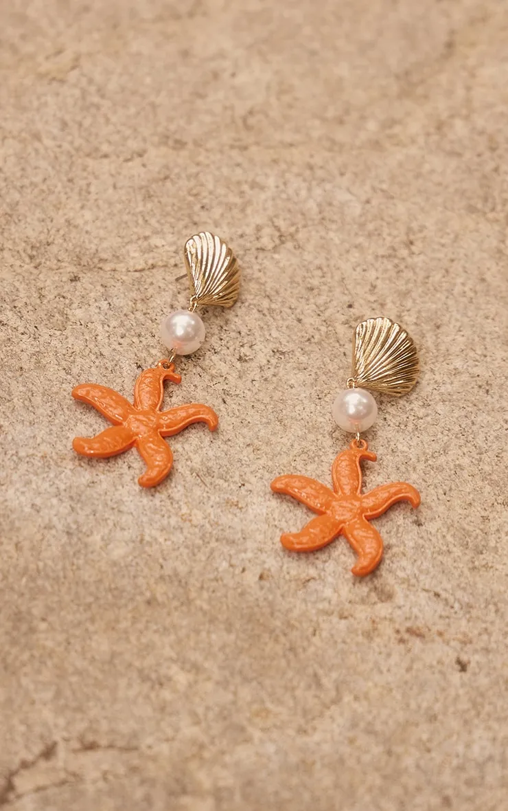 Boucles d'oreilles rouges à détail coquillage et étoile de mer